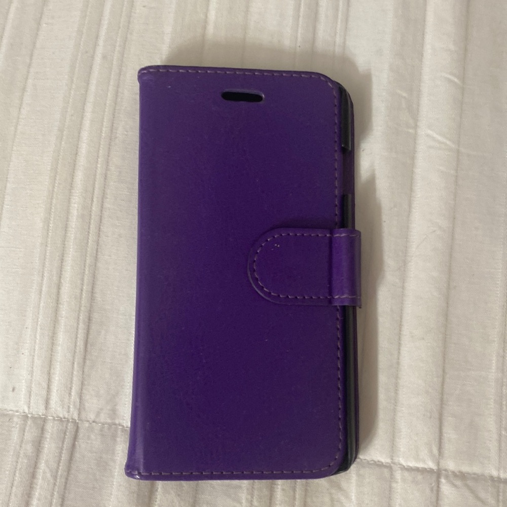 Purple cell phone case and holder with two slots for credit card or ID and a met